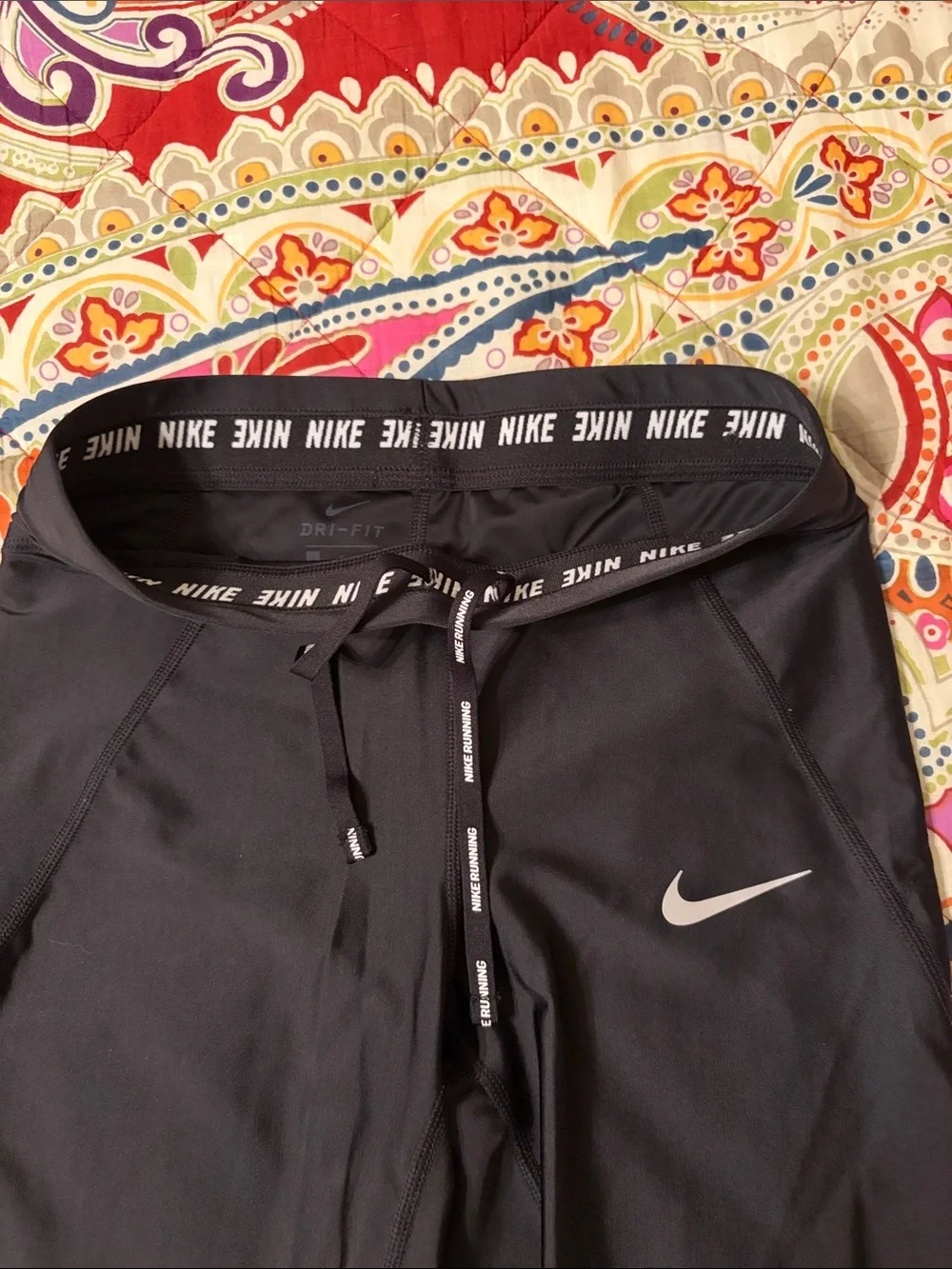 Women’s Nike Black Leggings with White Swoosh Logo